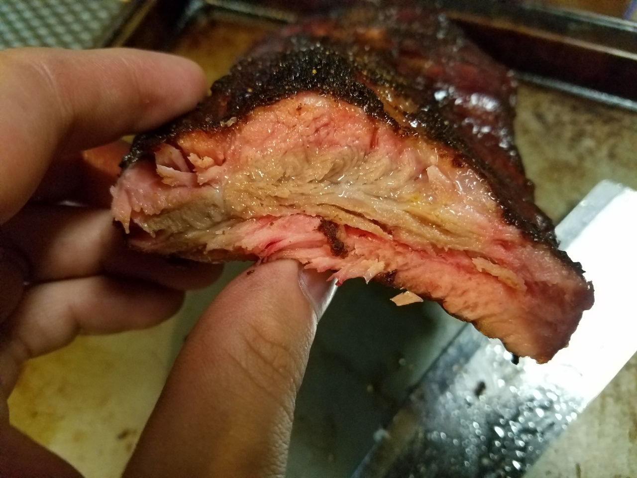 Tender baby back ribs with a smoke ring
