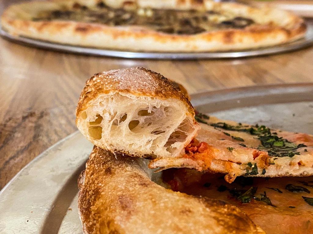 Cornicione or crust of a Margherita pizza
